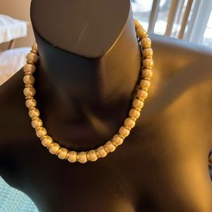 Jones New York, gold and pearl necklace. 21 inches in length.